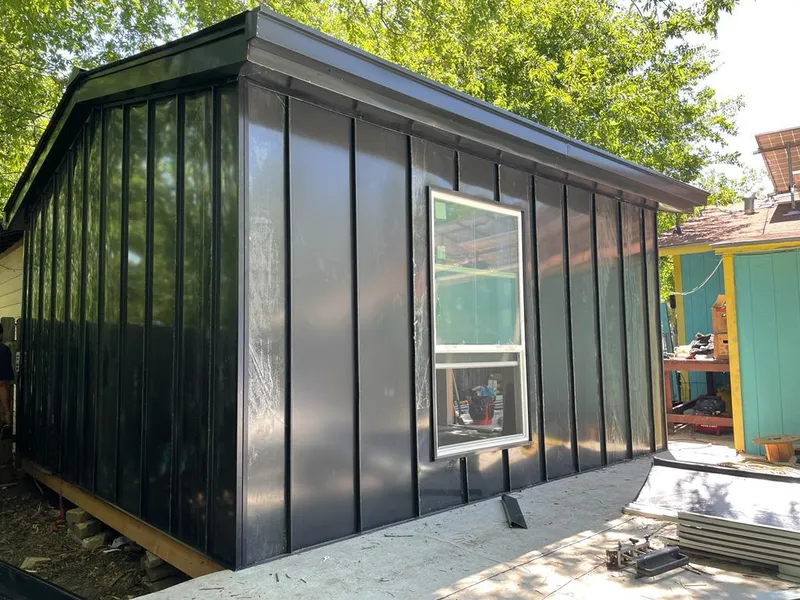 Black standing seam metal wall panels for Roof Inspection in Lake Shore